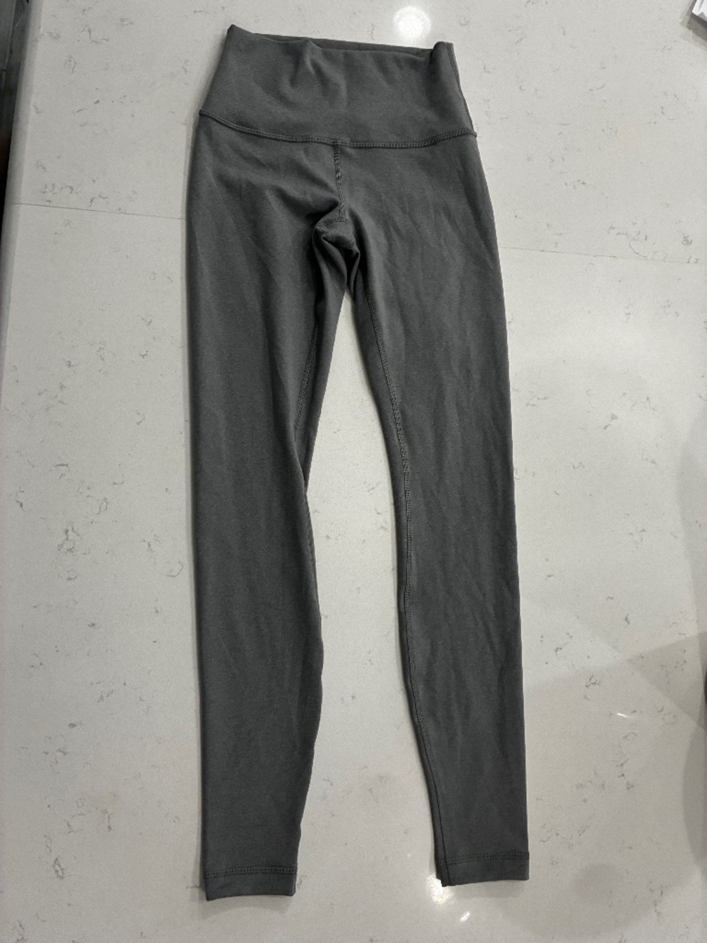 Like new lululemon leggings, size 4,grey/silver